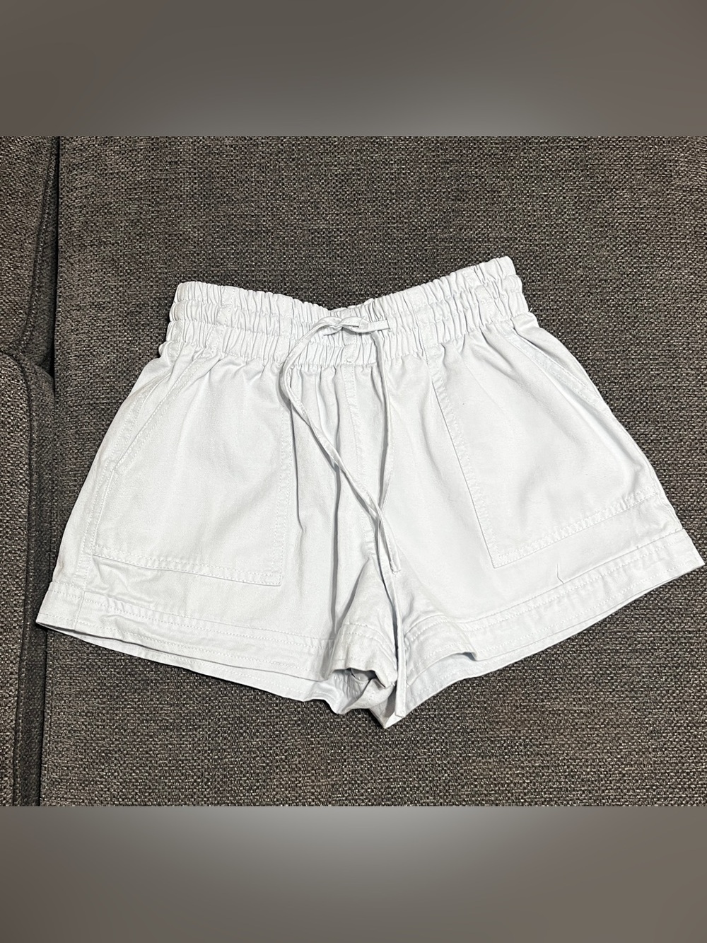 Forever 21 light blue denim high waisted drawstring shorts.